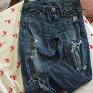Light ish colored skinny jeans distressed